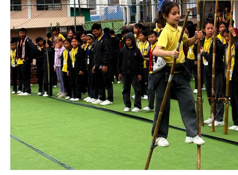 Stilt-walking at the traditional games event